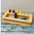 Materiale Montessori Tavoletta per imbucare con 3 coppie di cilindri (disponibile tra 10gg)-MON-F-56-21
